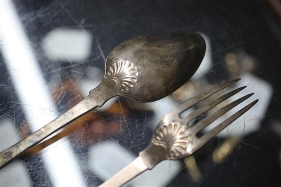 A part canteen of George III/George IV silver fiddle and shell pattern flatware by Josiah & George Piercy and George Piercy,